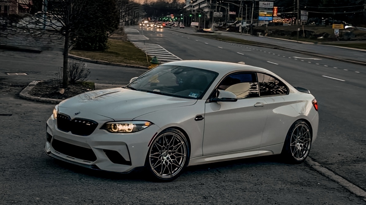 White BMW M2 Competition on forged multi-spoke wheels